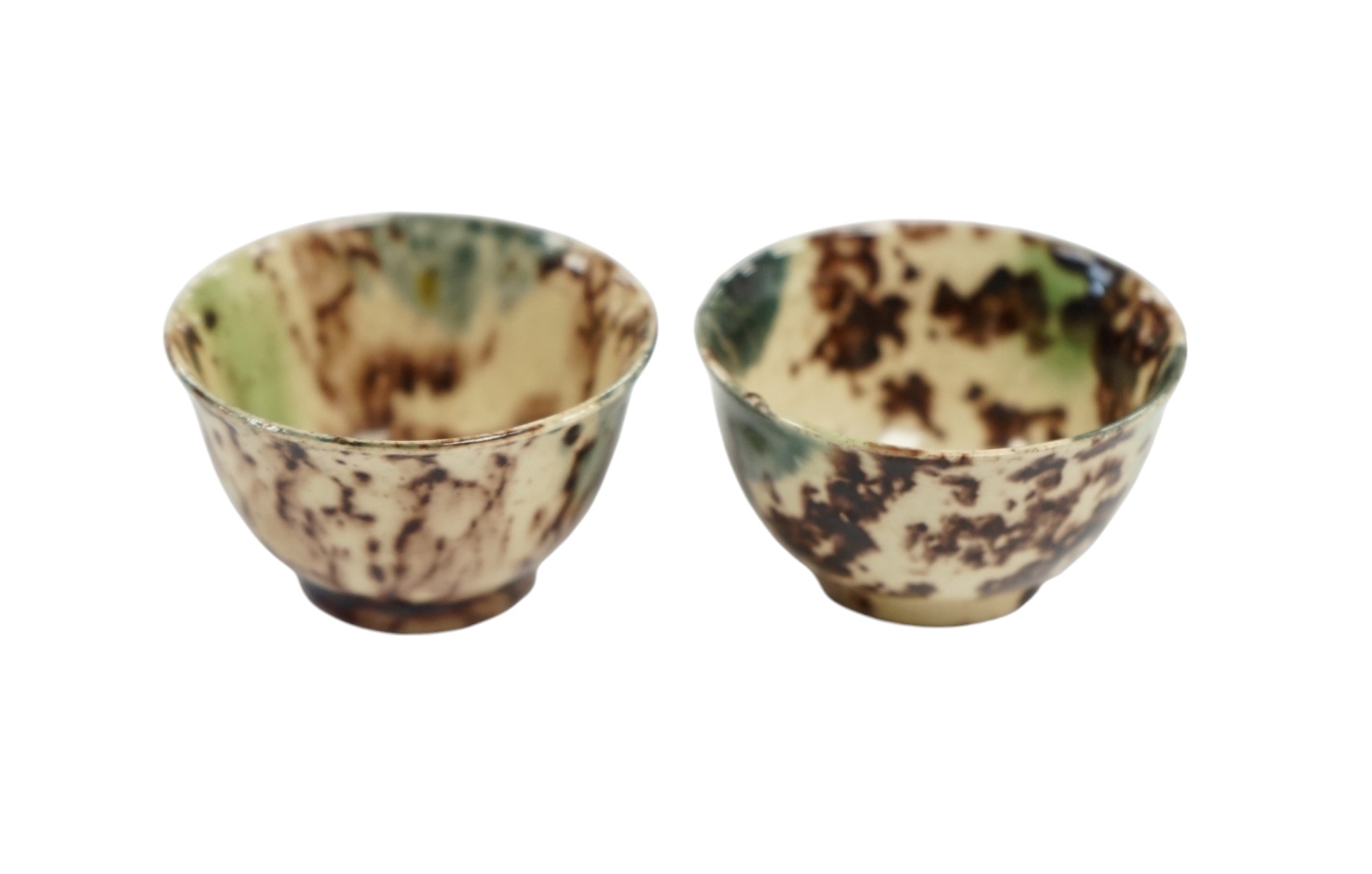 A pair of 18th century Whieldon-type miniature bowls, top rim 4.5cm diameter. Condition - some small chips to base